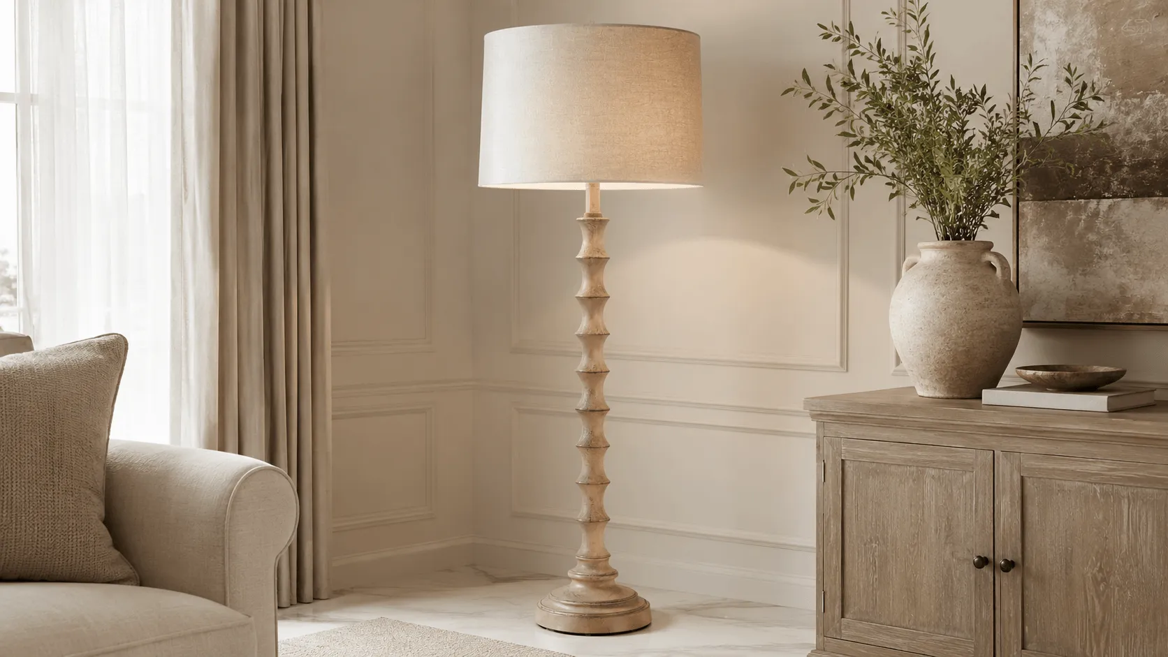 Decorative floor lamp YP604-58 with a carved natural wood-tone column and light neutral drum shade in a bright elegant interior