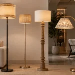 Wide modern interior showroom featuring multiple decorative floor lamps including metal, ceramic, and woven shade designs for commercial interiors
