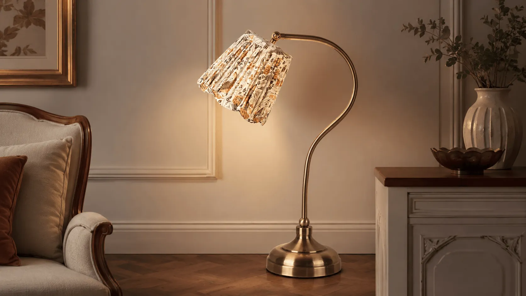 Metal floor lamp YP604-60 with a curved brass-tone stem, round base, and floral pleated shade in a classic interior corner
