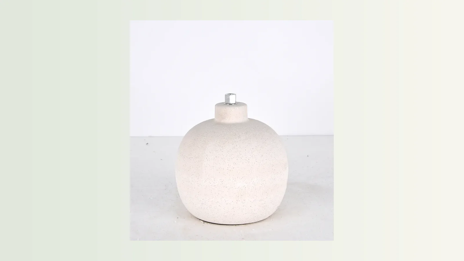 Green marble loop portable lamp for a compact side table